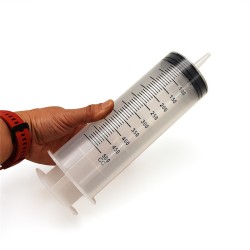 large plastic syringe